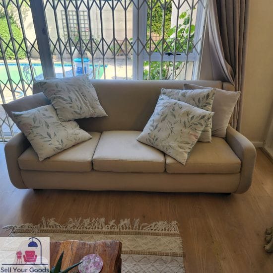 Three seater fabric couch with cushions slight kitty damage