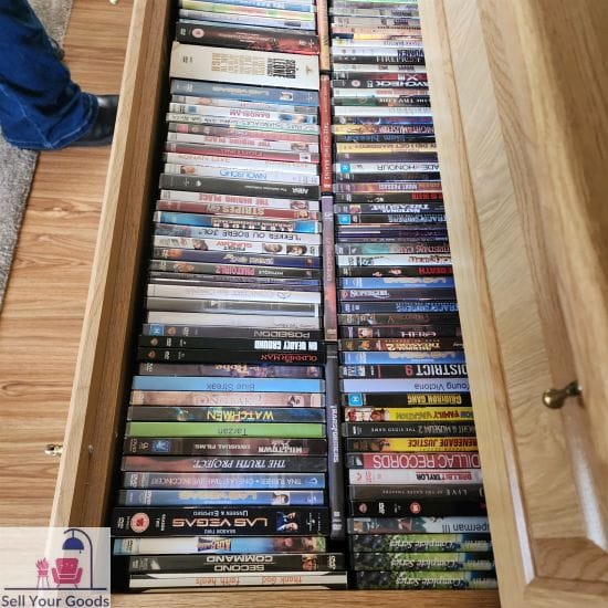 Three racks with dvds plus extra dvds - Image 3