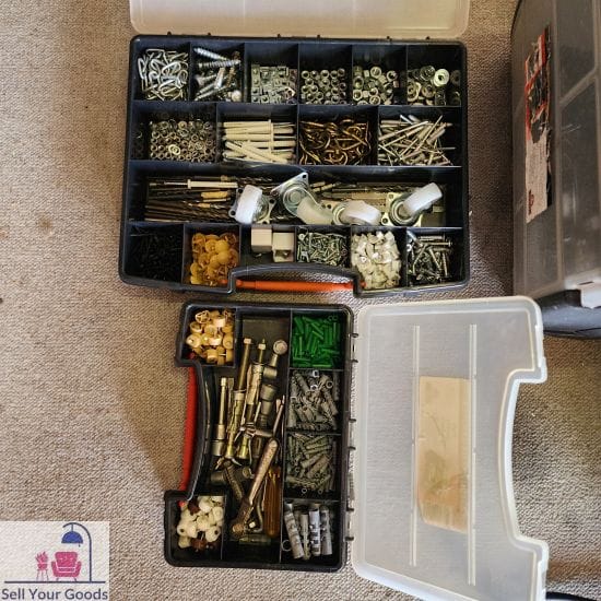 Two holders with screws and odds
