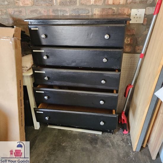 Black chest of drawers one drawer is sticky
