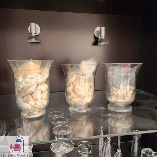 Three vases with shells