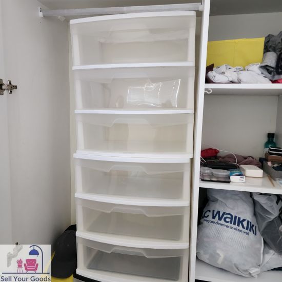 Two white storage drawers