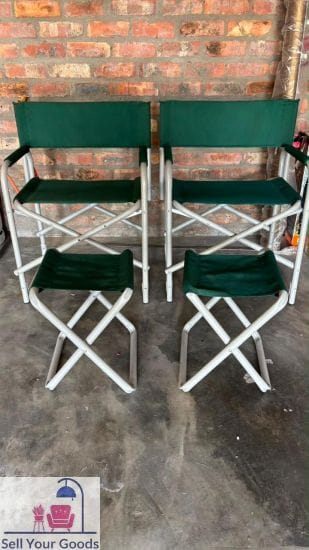 Two camping chairs with footstools