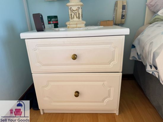 Two white pedestals