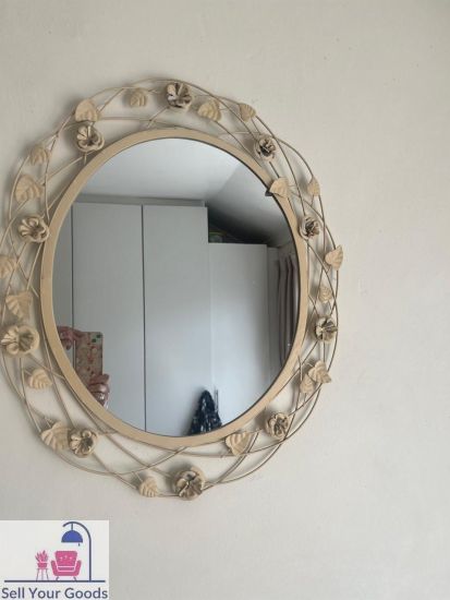 Metal ornate framed mirror