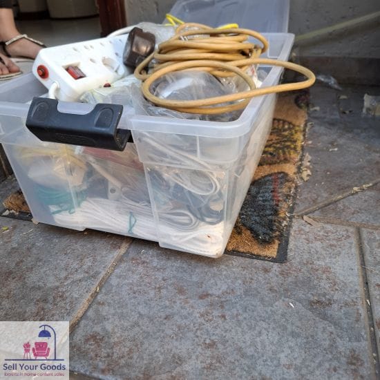 Crate with Extension cord, Plugs, etc