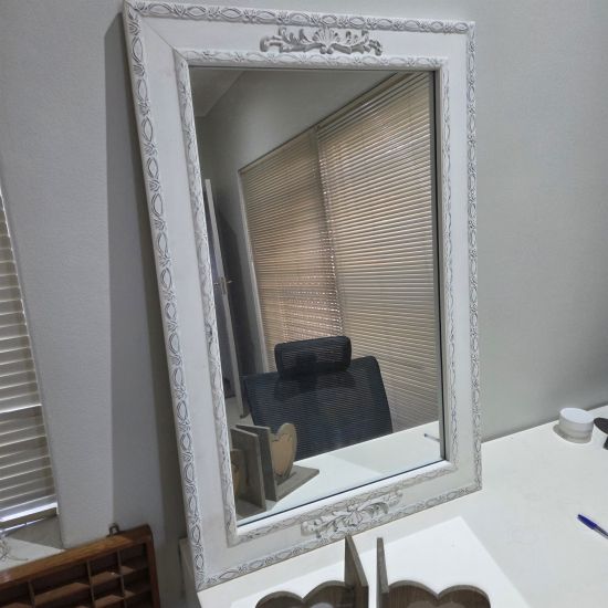 Ornate framed mirror