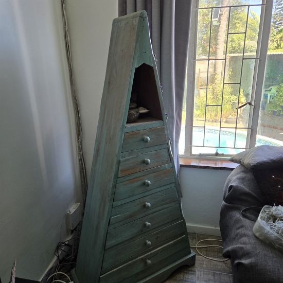 Tall wooden pyramid drawers