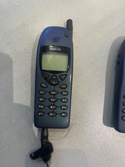 Blue Nokia with charager